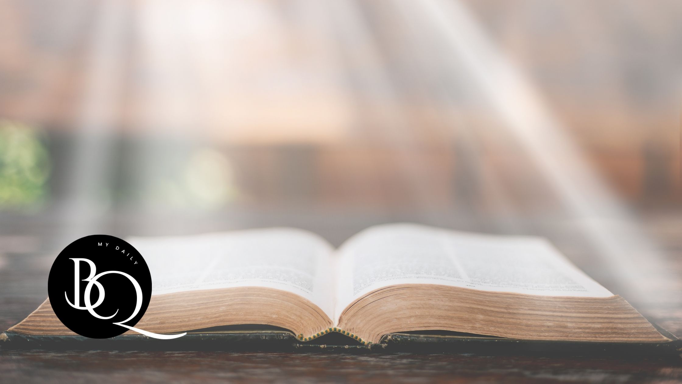 Bible verses for new beginnings- Bible open with a soft light from sunrise symbolizing new beginnings