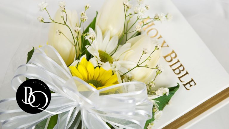 Bible Quotes for Weddings and Anniversaries - Flowers on Bible with the verse 'Above all, love each other deeply'