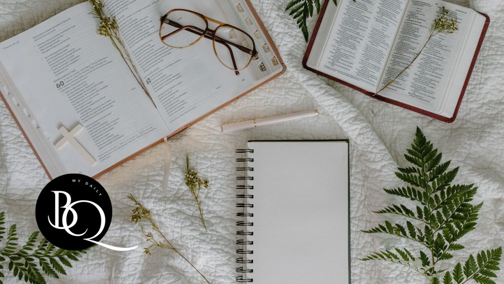 Open Bible on a cozy desk with a notebook and pen, ready for daily study